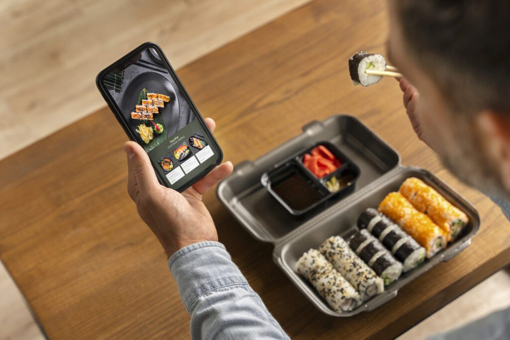 high angle man with sushi order scaled